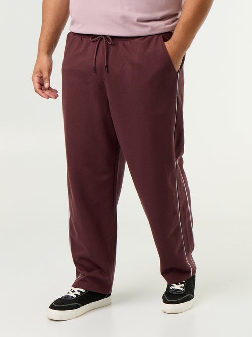 Pantalón de chándal con ribetes contrastados - Kiabi Pantalón de chándal con ribetes contrastados - Kiabi