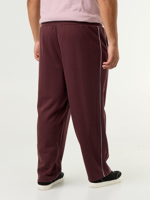 Pantalón de chándal con ribetes contrastados - Kiabi Pantalón de chándal con ribetes contrastados - Kiabi