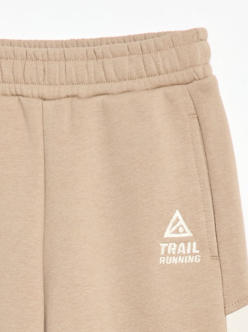 Pantalón de chándal de felpa con bloques de color Beige - Kiabi