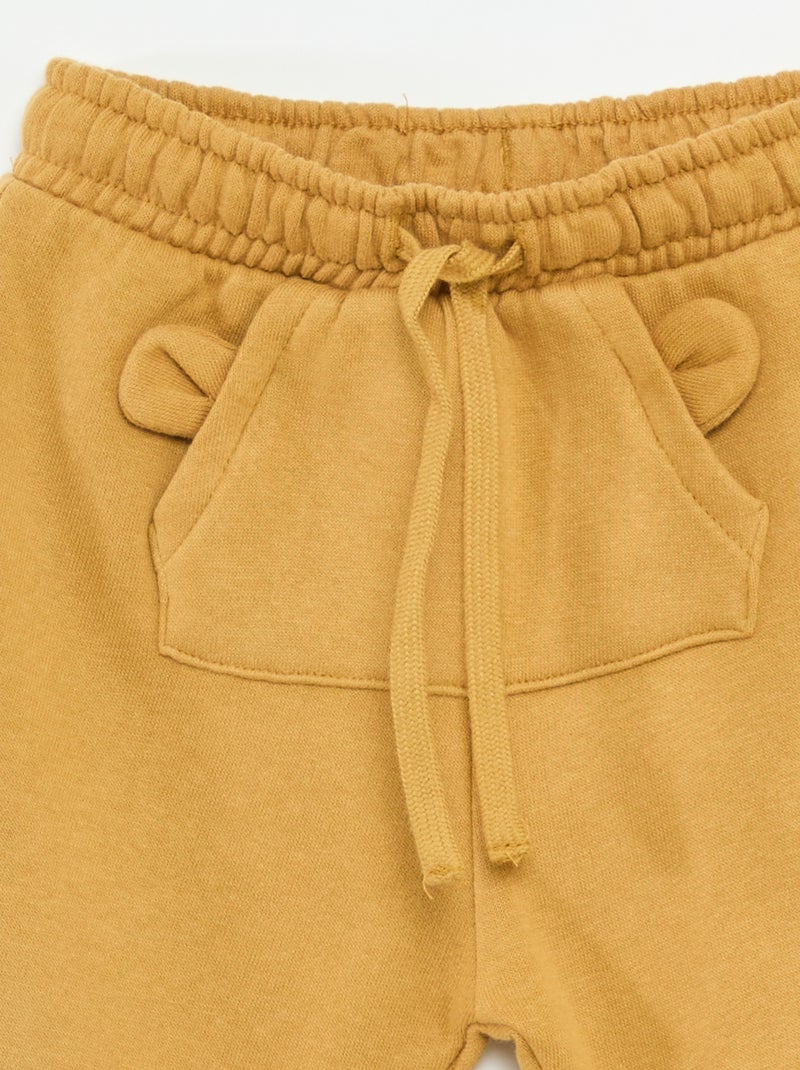 Pantalón de chándal de felpa con bolsillo tipo canguro y orejas fantasía Beige - Kiabi
