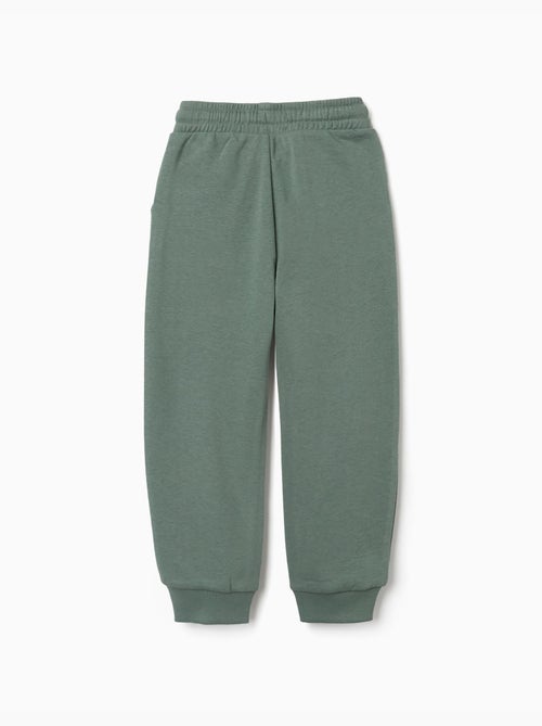 Pantalón de chándal de felpa con bolsillos y estampado ZY - Kiabi Pantalón de chándal de felpa con bolsillos y estampado ZY - Kiabi