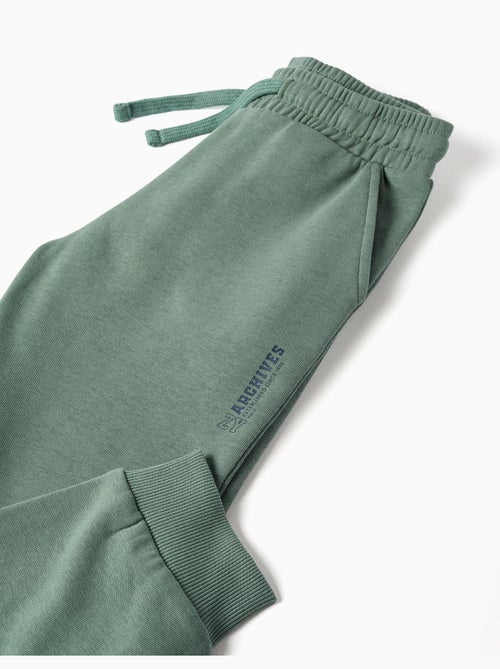 Pantalón de chándal de felpa con bolsillos y estampado ZY - Kiabi Pantalón de chándal de felpa con bolsillos y estampado ZY - Kiabi