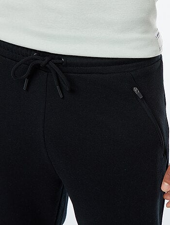 Pantalón de jogging de felpa ligera con bolsillos con cremallera