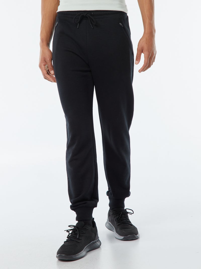 Pantalón de chándal de felpa ligera con bolsillos con cremallera negro - Kiabi