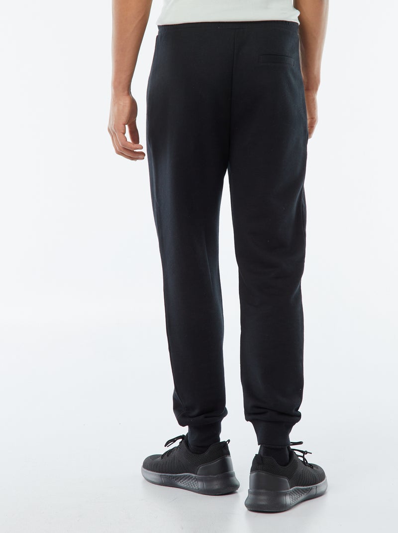Pantalón de chándal de felpa ligera con bolsillos con cremallera negro - Kiabi