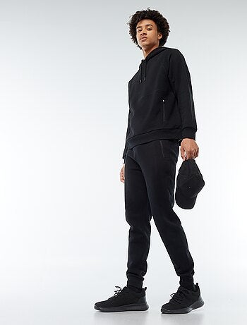 Pantalón de chándal en felpa perchada con 2 bolsillos con cremallera