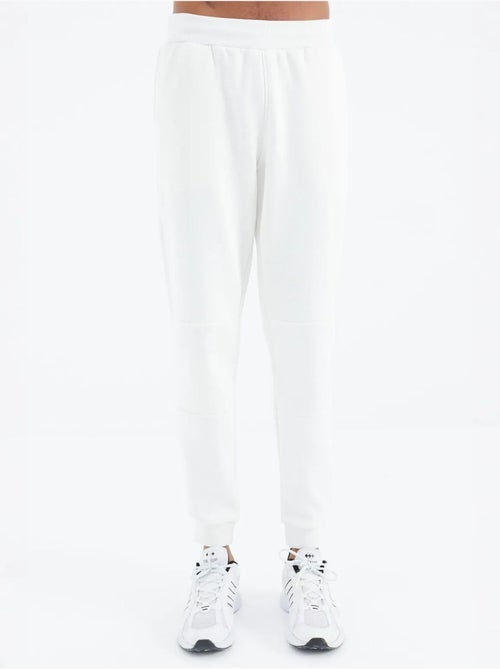 Pantalón de chándal de forro polar relaxed fit para hombre tommy - Kiabi Pantalón de chándal de forro polar relaxed fit para hombre tommy - Kiabi