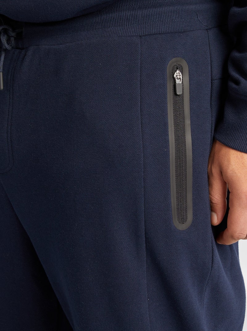 Pantalón de chándal de punto de piqué con bolsillos con cremallera azul - Kiabi