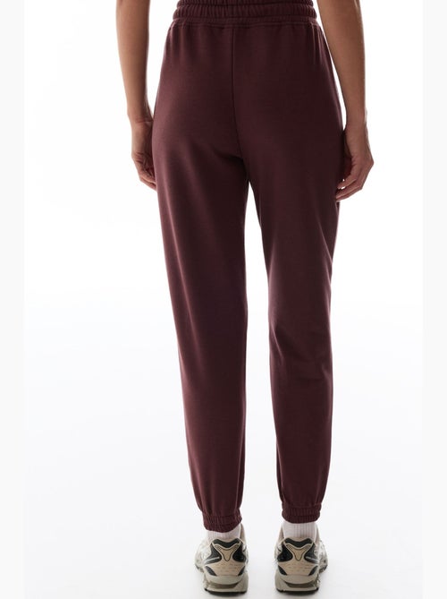 Pantalón de chándal de tiro alto con bajos elásticos penti - Kiabi Pantalón de chándal de tiro alto con bajos elásticos penti - Kiabi