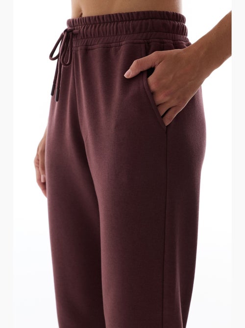 Pantalón de chándal de tiro alto con bajos elásticos penti - Kiabi Pantalón de chándal de tiro alto con bajos elásticos penti - Kiabi