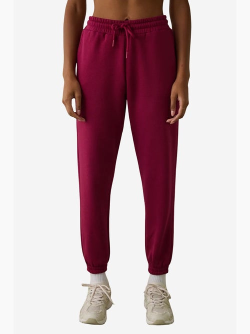 Pantalón de chándal de tiro alto con detalle de lazo, afelpado penti - Kiabi Pantalón de chándal de tiro alto con detalle de lazo, afelpado penti - Kiabi