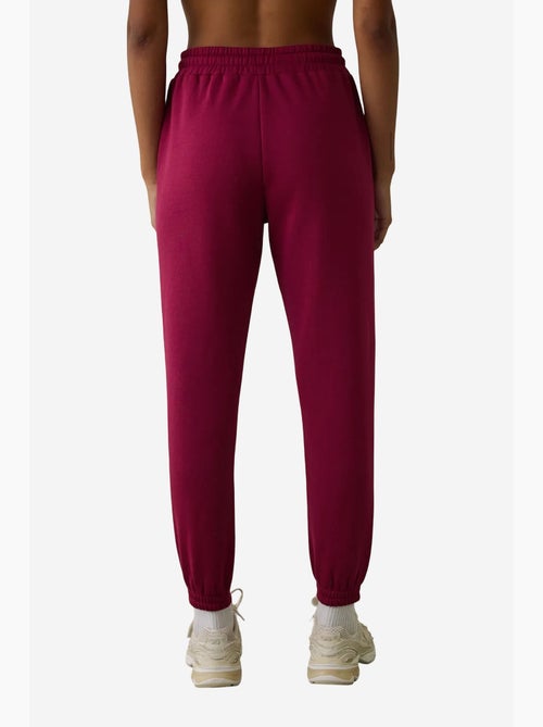Pantalón de chándal de tiro alto con detalle de lazo, afelpado penti - Kiabi Pantalón de chándal de tiro alto con detalle de lazo, afelpado penti - Kiabi