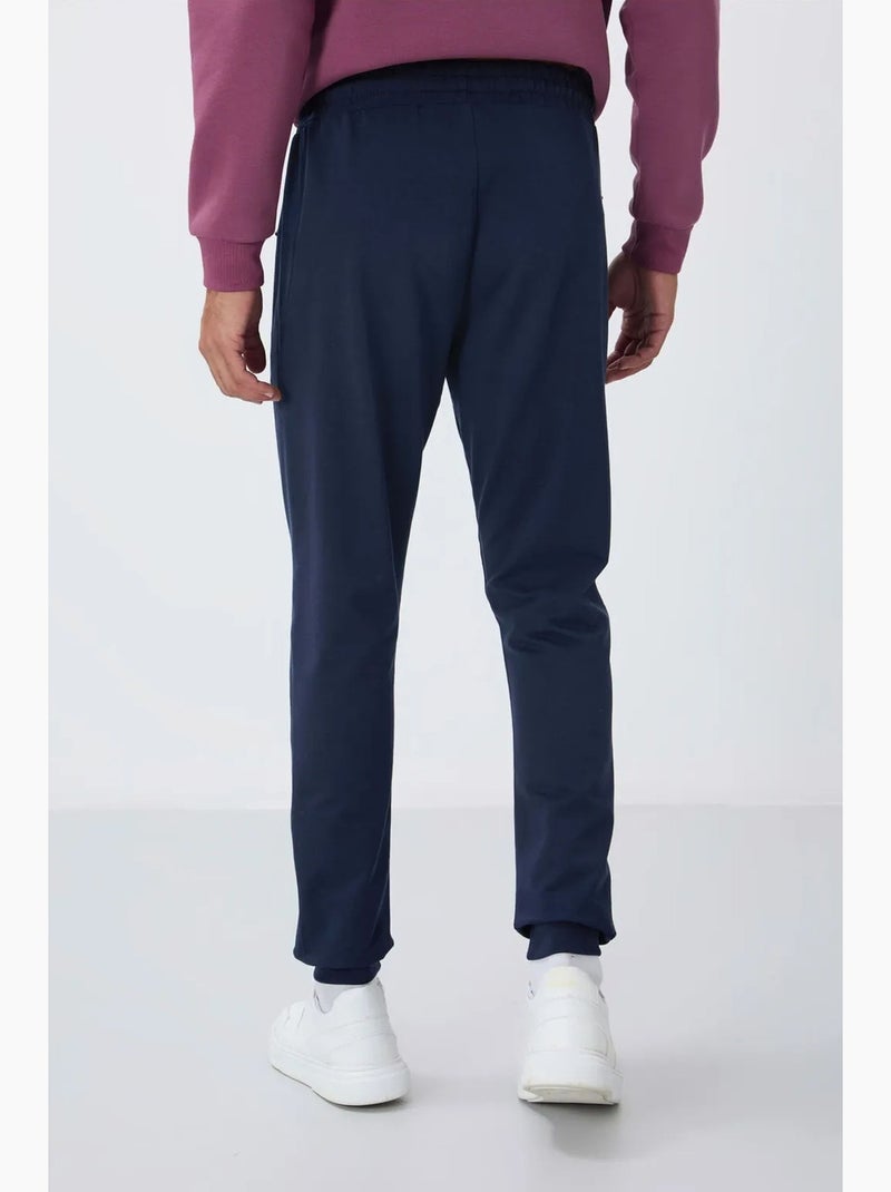 Pantalón de chándal jogger de hombre con bolsillo con cremallera tommy Azul marino - Kiabi