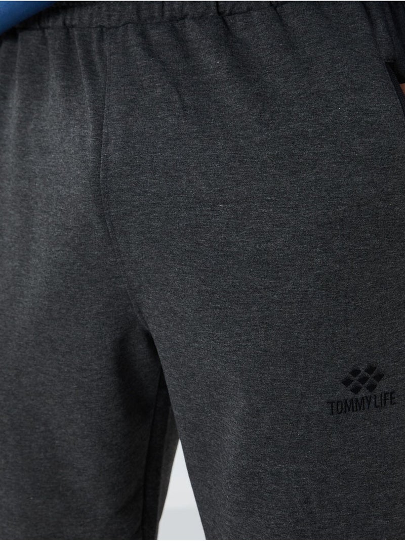 Pantalón de chándal jogger de hombre con bolsillo con cremallera tommy Gris negro - Kiabi