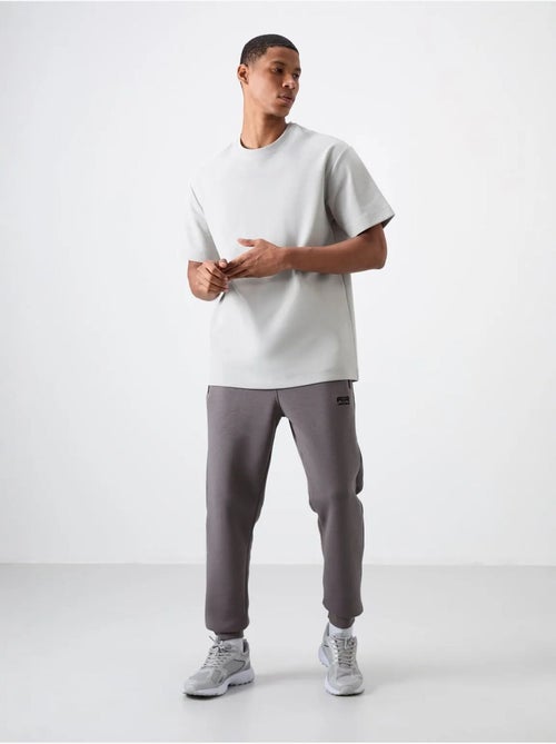Pantalón de chándal jogger de hombre tommy - Kiabi Pantalón de chándal jogger de hombre tommy - Kiabi