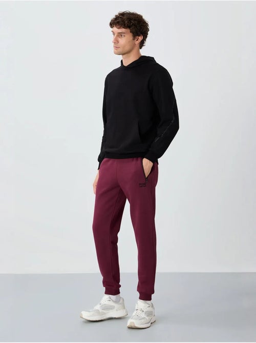 Pantalón de chándal jogger de hombre tommy - Kiabi Pantalón de chándal jogger de hombre tommy - Kiabi