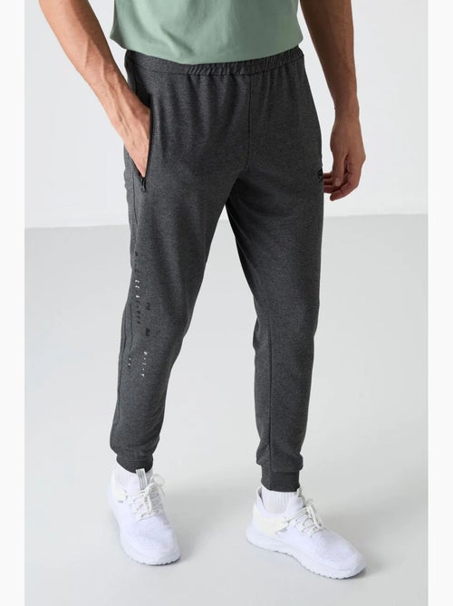 Pantalón de chándal jogger liso para hombre tommy - Kiabi Pantalón de chándal jogger liso para hombre tommy - Kiabi