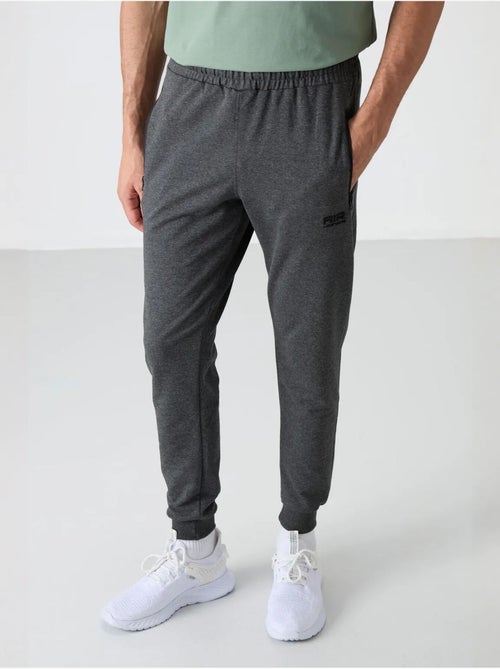 Pantalón de chándal jogger liso para hombre tommy - Kiabi Pantalón de chándal jogger liso para hombre tommy - Kiabi