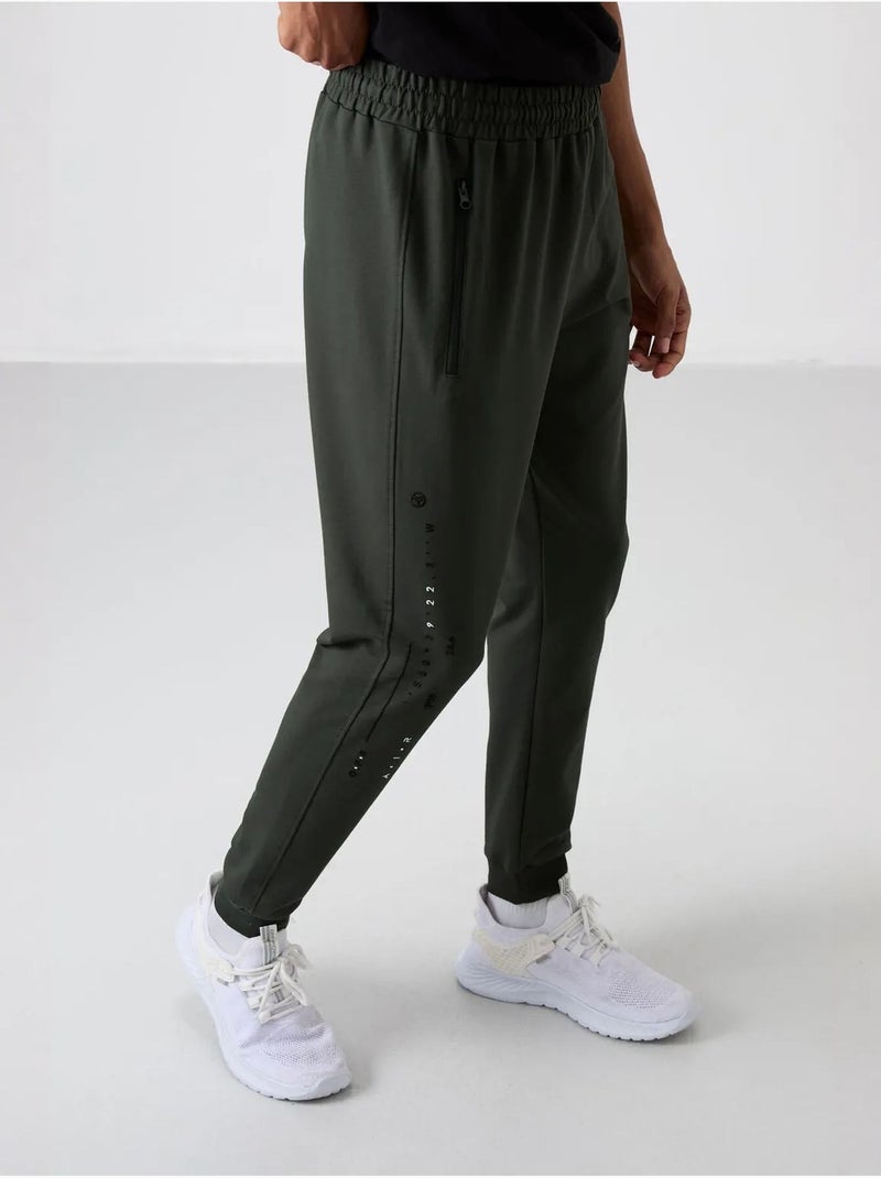 Pantalón de chándal jogger liso para hombre tommy Verde oscuro - Kiabi