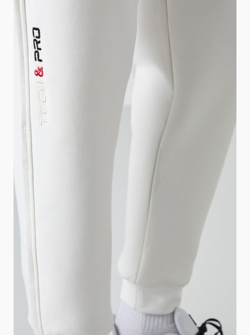 Pantalón de chándal jogger slim de hombre tommy Blanco roto - Kiabi