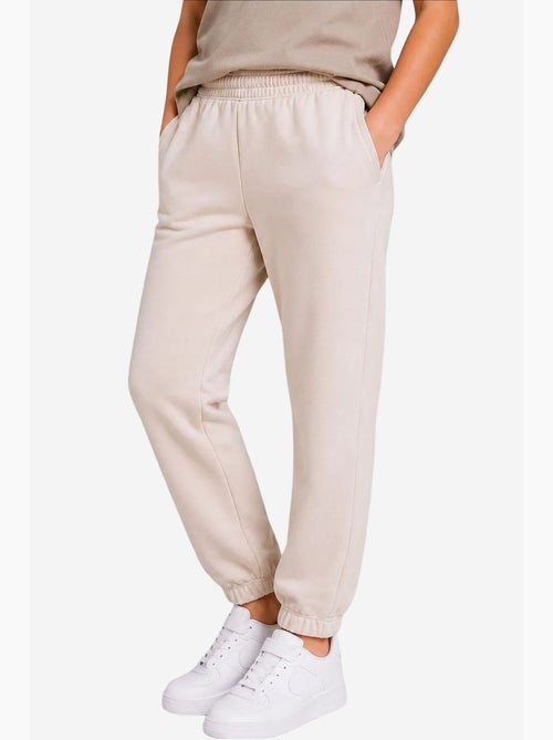 Pantalón de chándal juvenil unisex de algodón y poliéster tommy - Kiabi Pantalón de chándal juvenil unisex de algodón y poliéster tommy - Kiabi