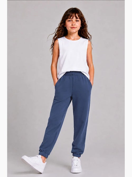 Pantalón de chándal juvenil unisex de algodón y poliéster tommy - Kiabi Pantalón de chándal juvenil unisex de algodón y poliéster tommy - Kiabi