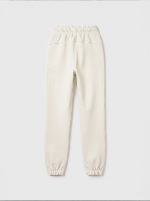Pantalón de chándal juvenil unisex de algodón y poliéster tommy - Kiabi Pantalón de chándal juvenil unisex de algodón y poliéster tommy - Kiabi