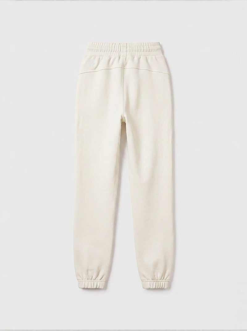 Pantalón de chándal juvenil unisex de algodón y poliéster tommy Crema - Kiabi