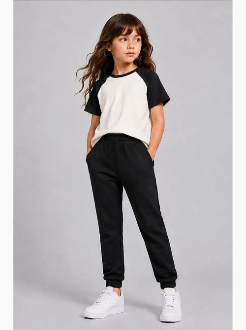 Pantalón de chándal juvenil unisex de algodón y poliéster tommy - Kiabi Pantalón de chándal juvenil unisex de algodón y poliéster tommy - Kiabi