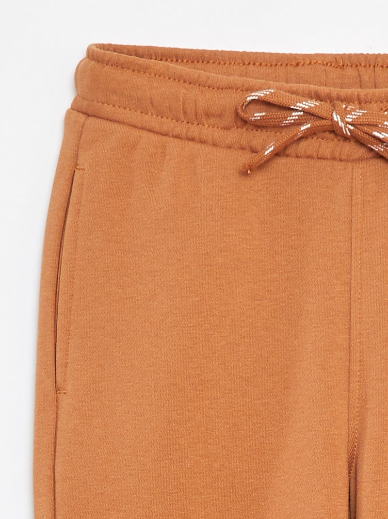 Pantalón de chándal liso - Corte + ajustado Marron - Kiabi