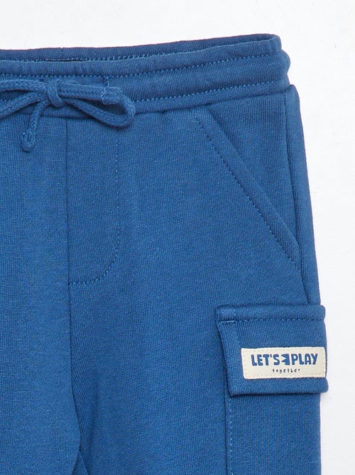 Pantalón de chándal liso con bolsillos con solapa - Kiabi