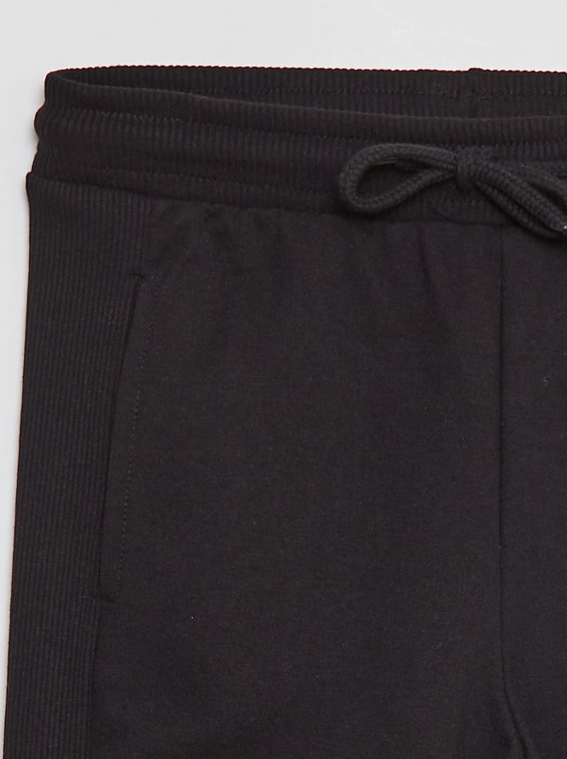 Pantalón de chándal liso con bolsillos negro - Kiabi