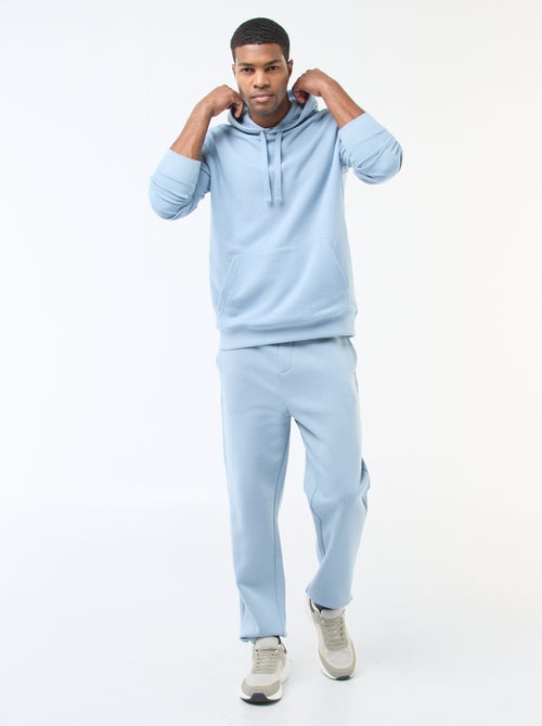 Pantalón de chándal liso con cordones ajustables en la cintura - Kiabi Pantalón de chándal liso con cordones ajustables en la cintura - Kiabi