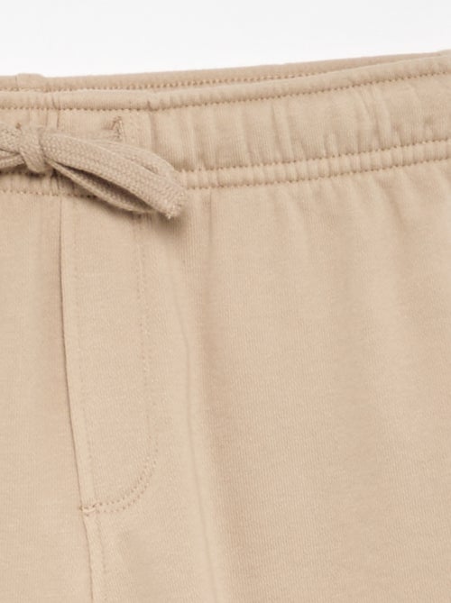 Pantalón de chándal liso de felpa francesa - Kiabi Pantalón de chándal liso de felpa francesa - Kiabi
