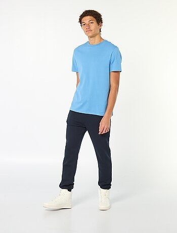 Pantalón de chándal en felpa perchada con 2 bolsillos con cremallera