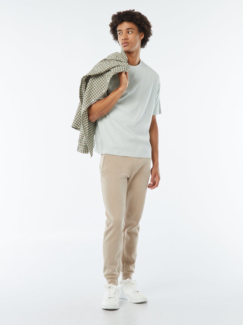 Pantalón de chándal perchado con 2 bolsillos con cremallera beige - Kiabi