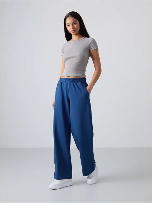 Pantalón de chándal pull-on de pernera ancha tommy - Kiabi Pantalón de chándal pull-on de pernera ancha tommy - Kiabi