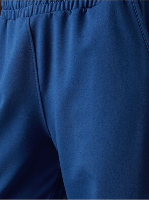 Pantalón de chándal pull-on de pernera ancha tommy - Kiabi Pantalón de chándal pull-on de pernera ancha tommy - Kiabi