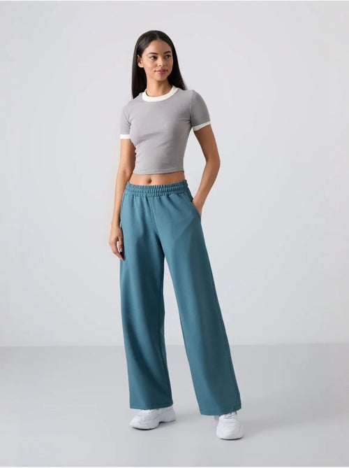 Pantalón de chándal pull-on de pernera ancha tommy - Kiabi Pantalón de chándal pull-on de pernera ancha tommy - Kiabi
