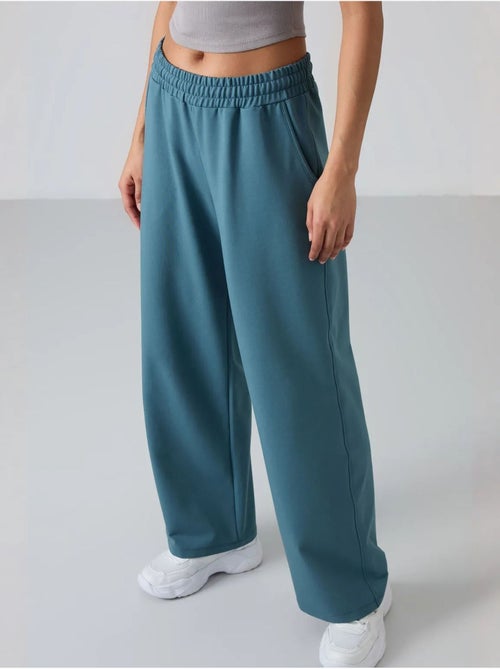 Pantalón de chándal pull-on de pernera ancha tommy - Kiabi Pantalón de chándal pull-on de pernera ancha tommy - Kiabi