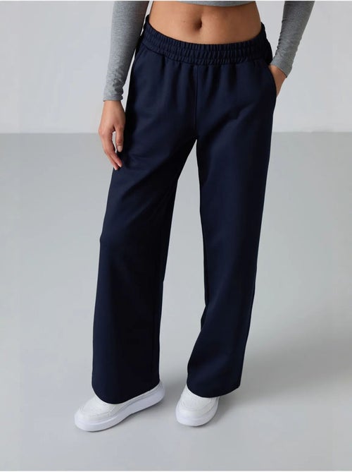 Pantalón de chándal pull-on de pernera ancha tommy - Kiabi Pantalón de chándal pull-on de pernera ancha tommy - Kiabi