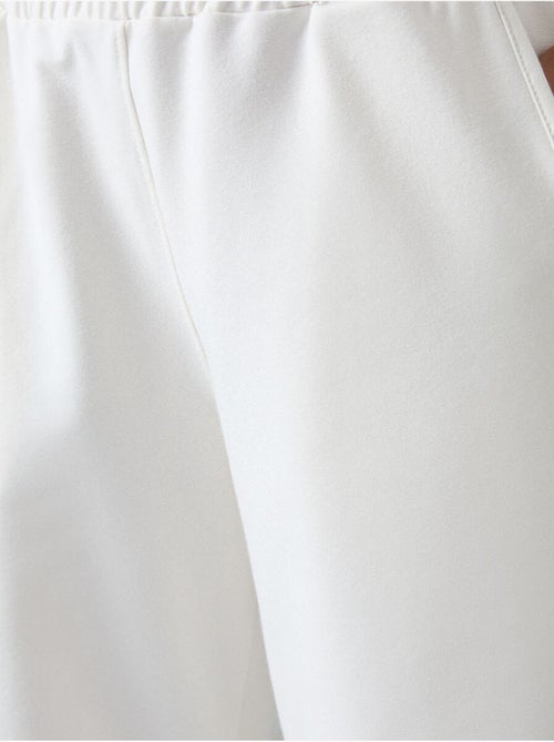 Pantalón de chándal pull-on de pernera ancha tommy - Kiabi Pantalón de chándal pull-on de pernera ancha tommy - Kiabi