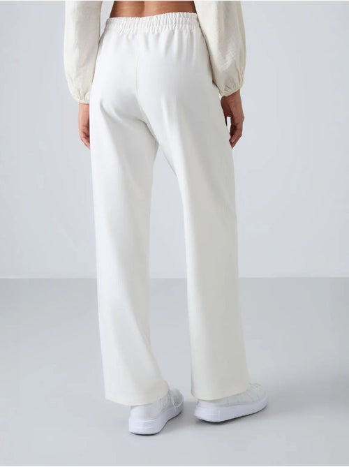 Pantalón de chándal pull-on de pernera ancha tommy - Kiabi Pantalón de chándal pull-on de pernera ancha tommy - Kiabi
