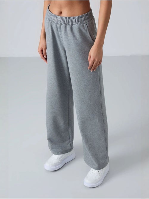 Pantalón de chándal pull-on de pernera ancha tommy - Kiabi Pantalón de chándal pull-on de pernera ancha tommy - Kiabi