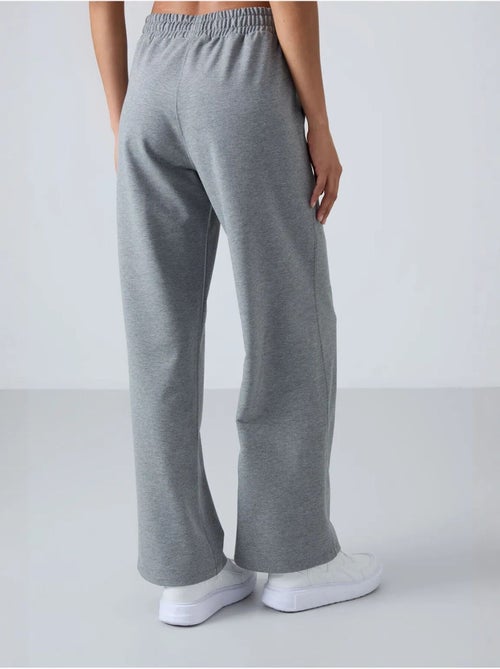 Pantalón de chándal pull-on de pernera ancha tommy - Kiabi Pantalón de chándal pull-on de pernera ancha tommy - Kiabi