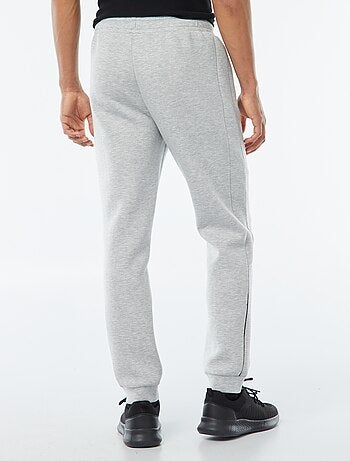 Pantalón de chándal tipo neopreno con bolsillos con cremallera