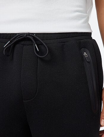 Pantalón de chándal tipo neopreno con bolsillos con cremallera