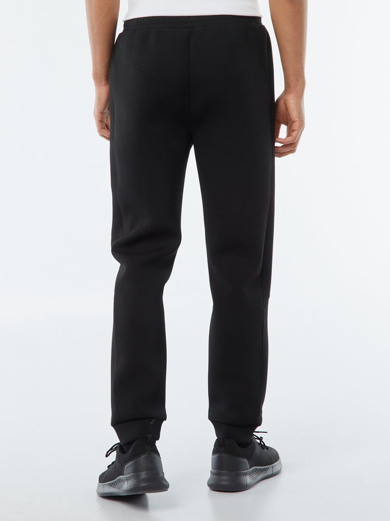 Pantalón de chándal tipo neopreno con bolsillos con cremallera negro - Kiabi