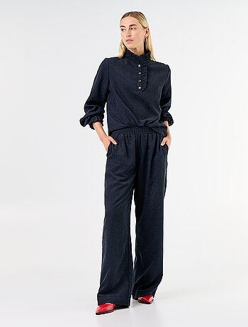 Pantalón de corte ancho de pana
