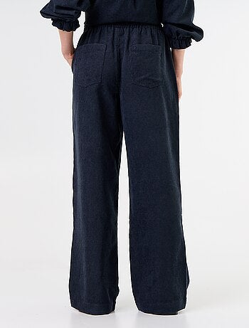 Pantalón de corte ancho de pana